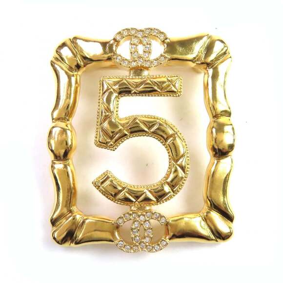 CHANEL Gold Logo Brooch
